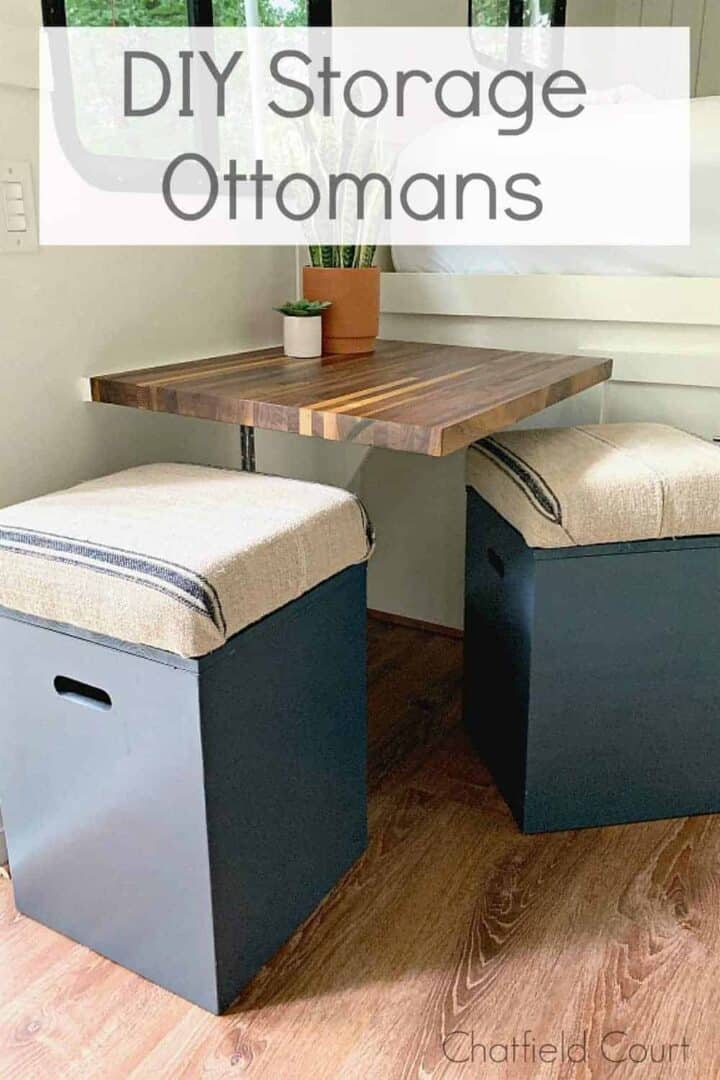 2 navy DIY storage ottomans lined up against a wall in an RV
