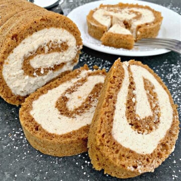 sliced pumpkin roll on black board