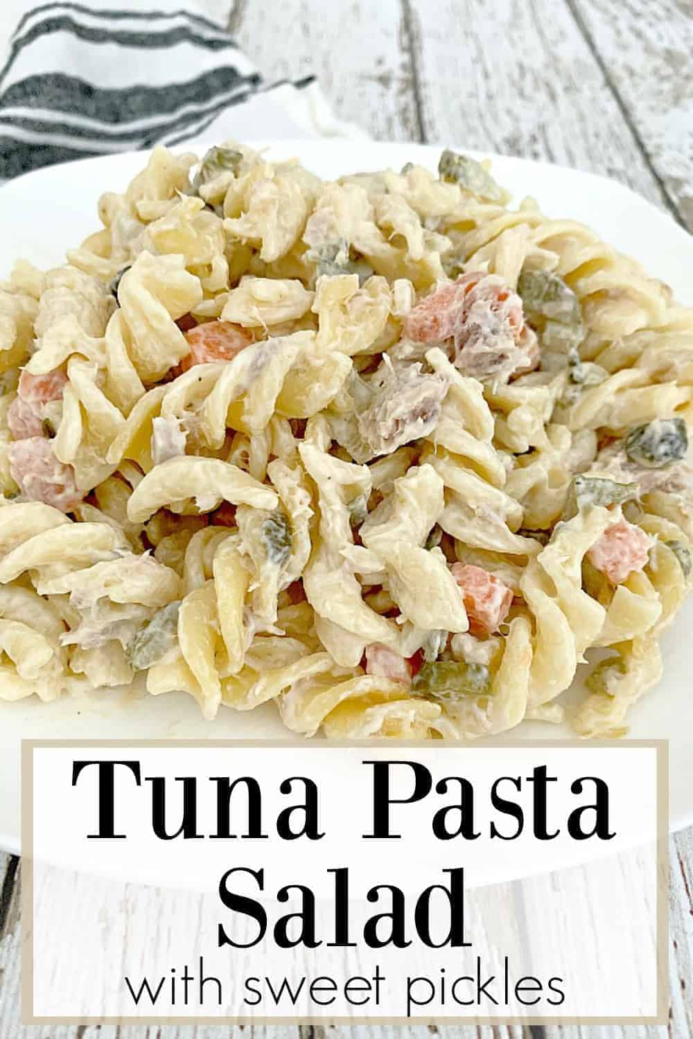 easy tuna pasta salad on white plate with large graphic