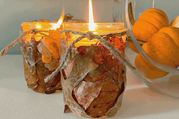 fall leaf candle holders on white buffet