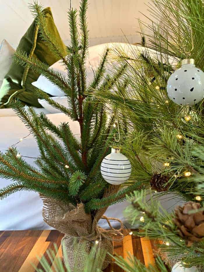 closeup of faux Christmas trees and tiny ornaments