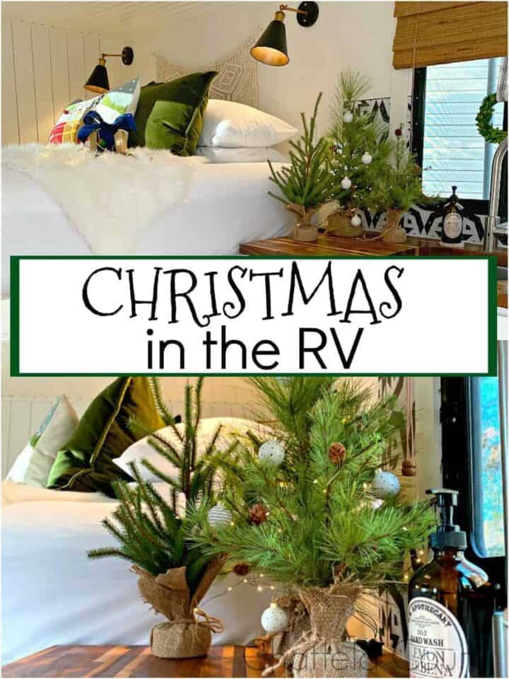 view of kitchen and bed decorated for Christmas in RV and faux Christmas trees on counter