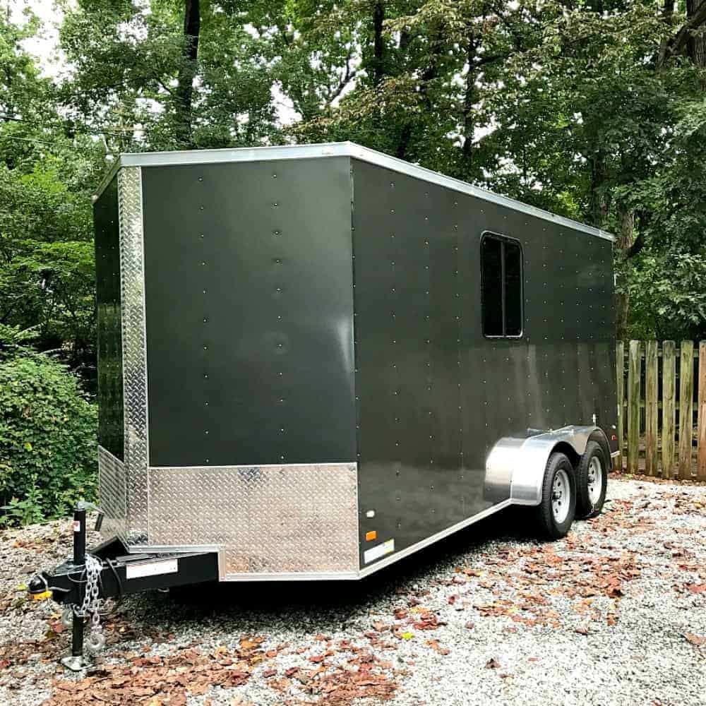 gray cargo trailer in driveway