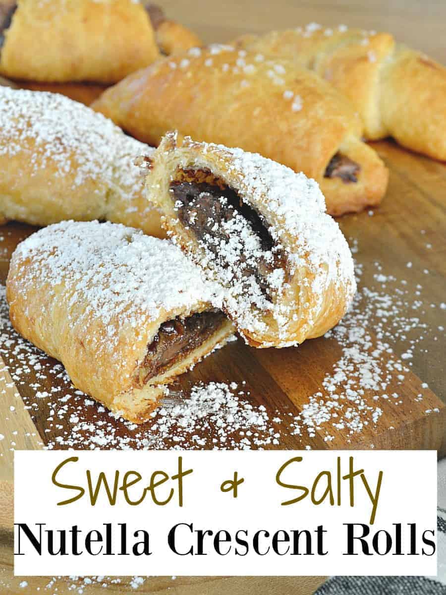 sweet and salty crescent rolls on cutting board covered in powdered sugar