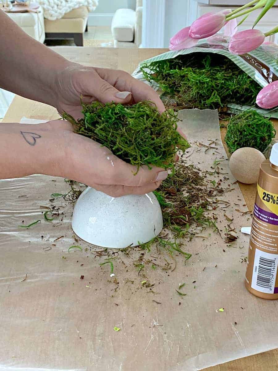 putting moss on paper mache Easter egg