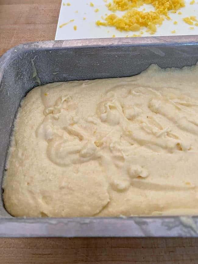 lemon loaf batter in greased and floured loaf pan