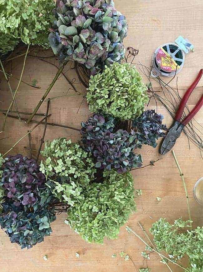 dried hydrangea flowers on a grapevine wreath