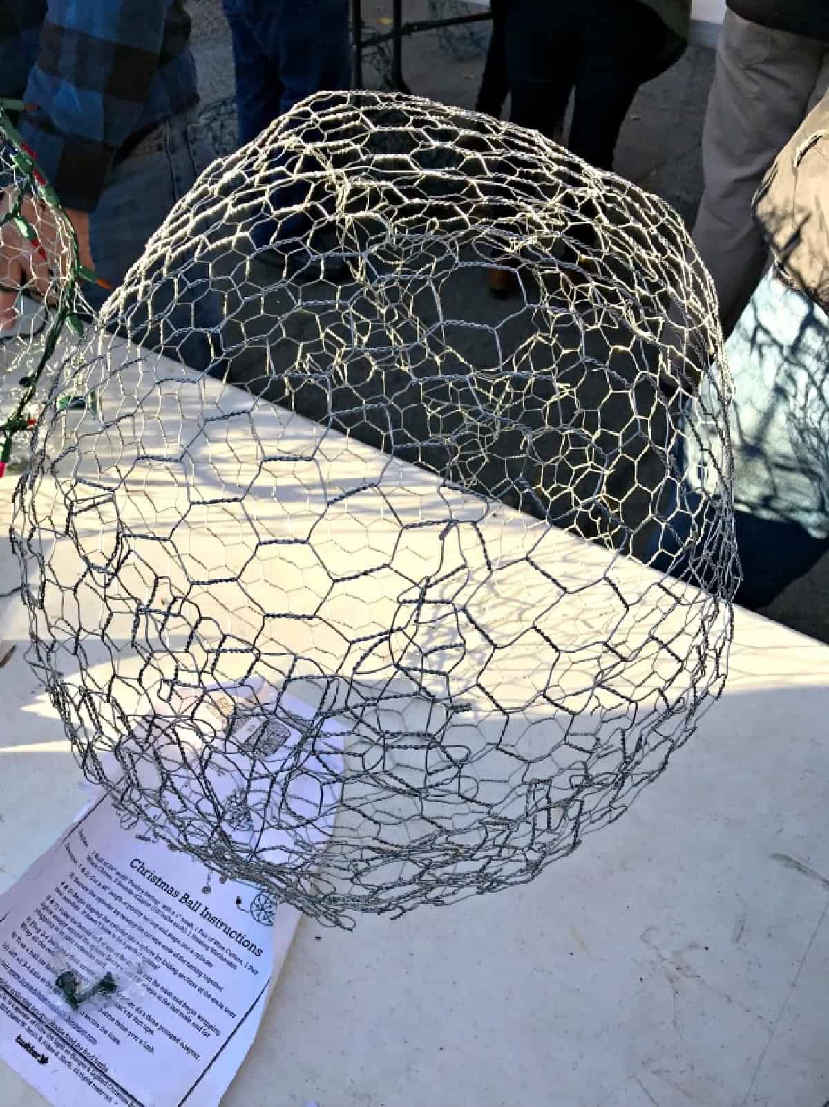 How to Make Lighted Christmas Balls (And How to Hang Them) snap finished form for DIY lighted chicken wire Christmas ball