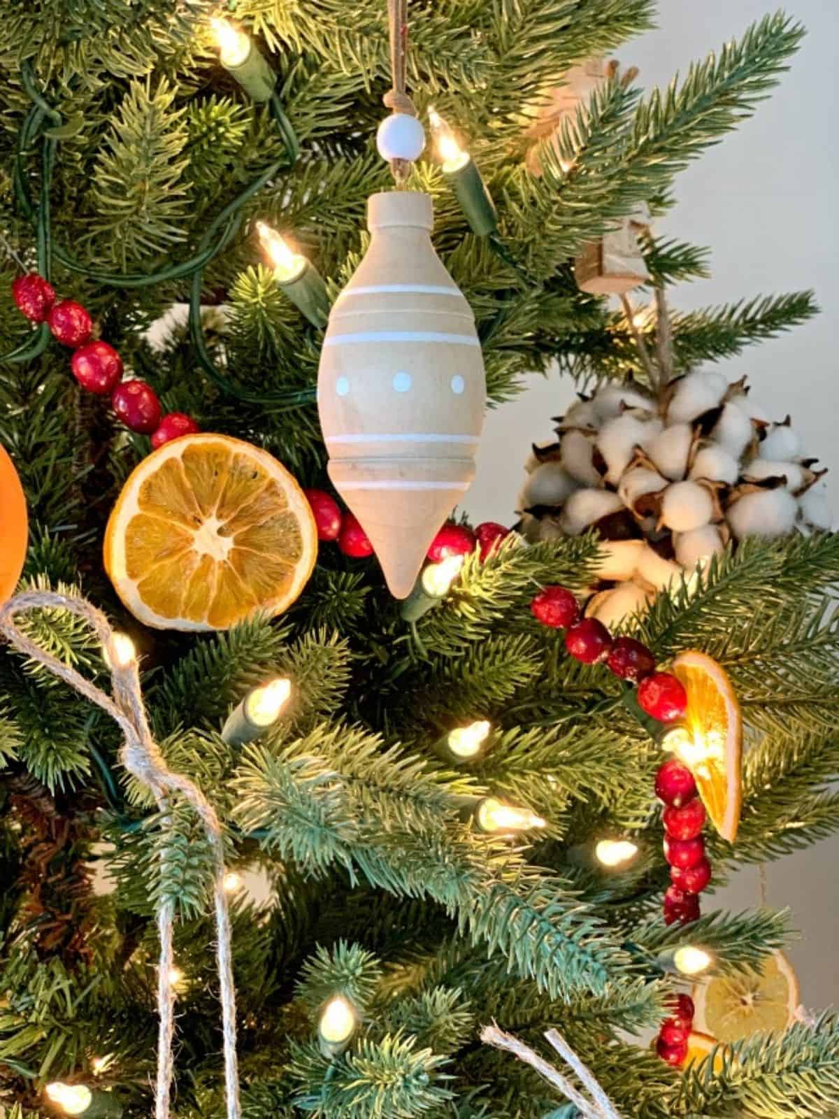 orange slice and cranberry garland on tree