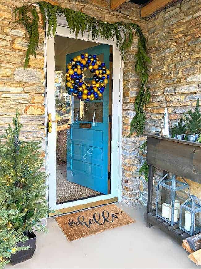 ornament wreath hanging on front door