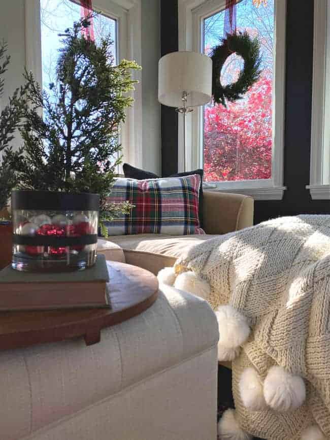 view of sunroom windows with hanging wreaths