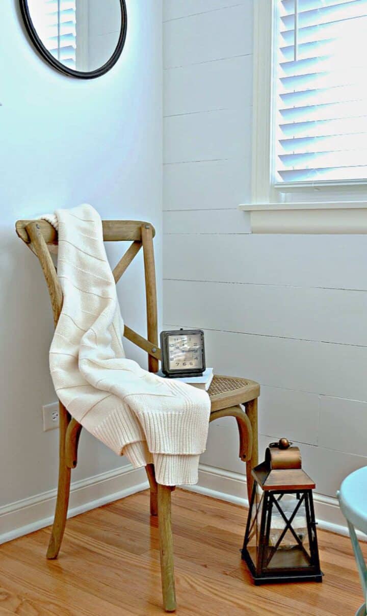 A chair sitting in front of a window