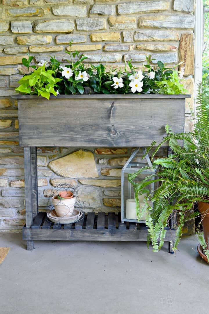 DIY raised planter box with shelf