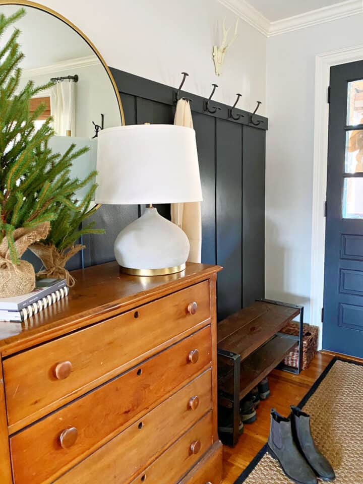 Easy Board and Batten Accent Wall shot small entry with dark painted front door and board and batten accent wall