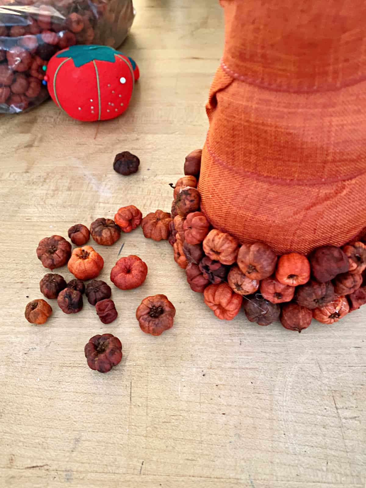 tiny pumpkins on styrofoam