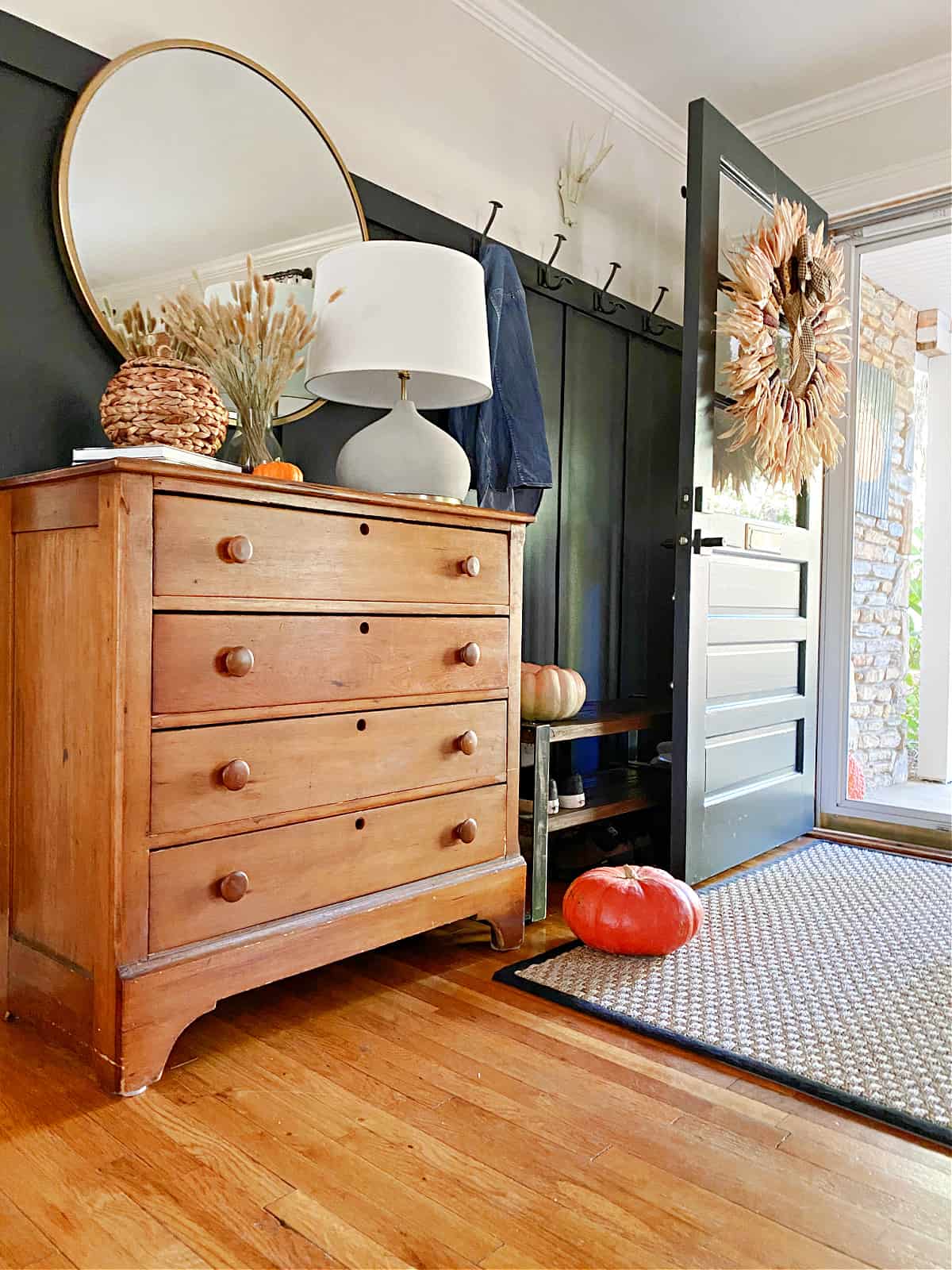 entryway decorated for fall