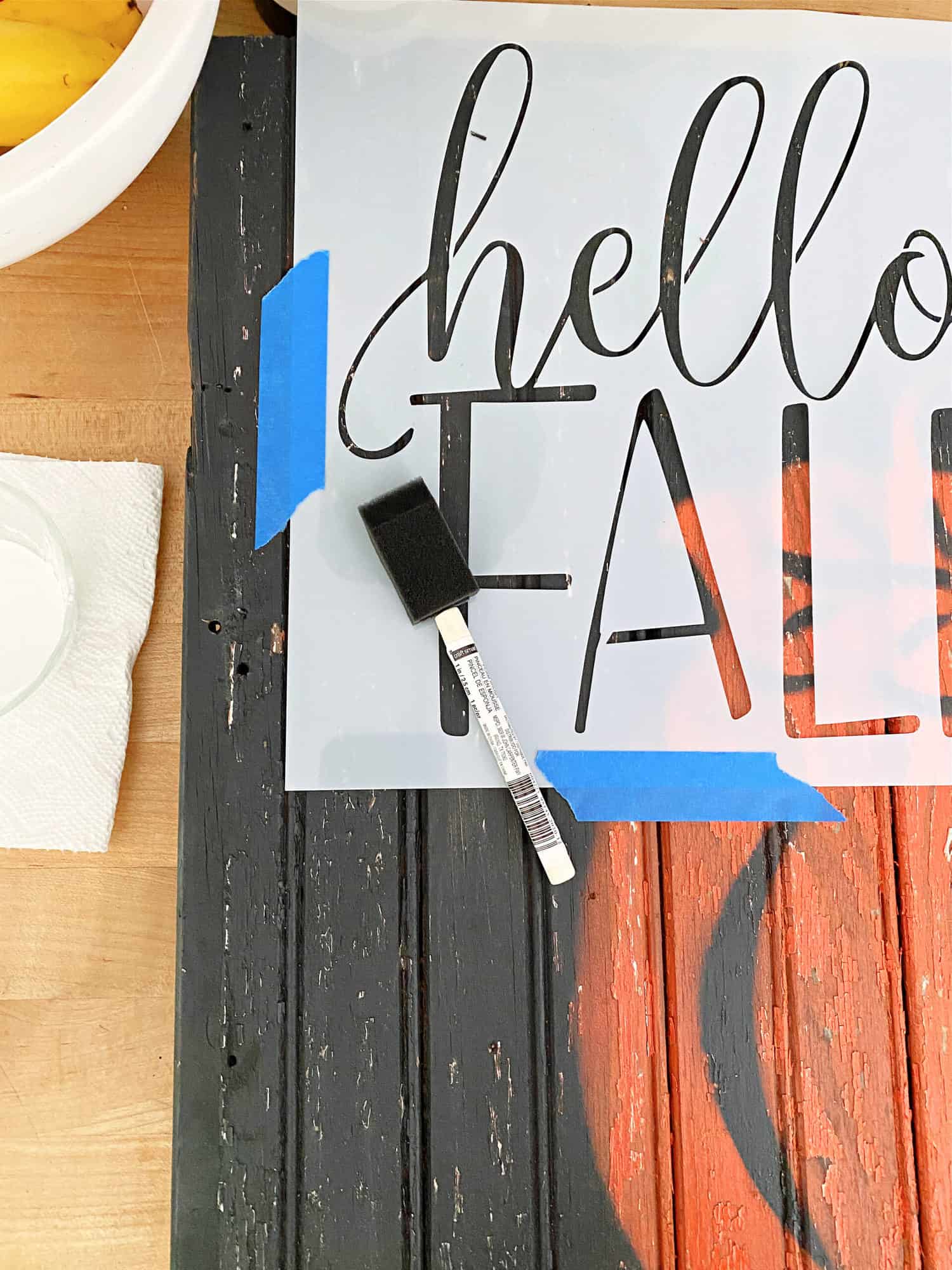 stencil and wood pumpkin sign