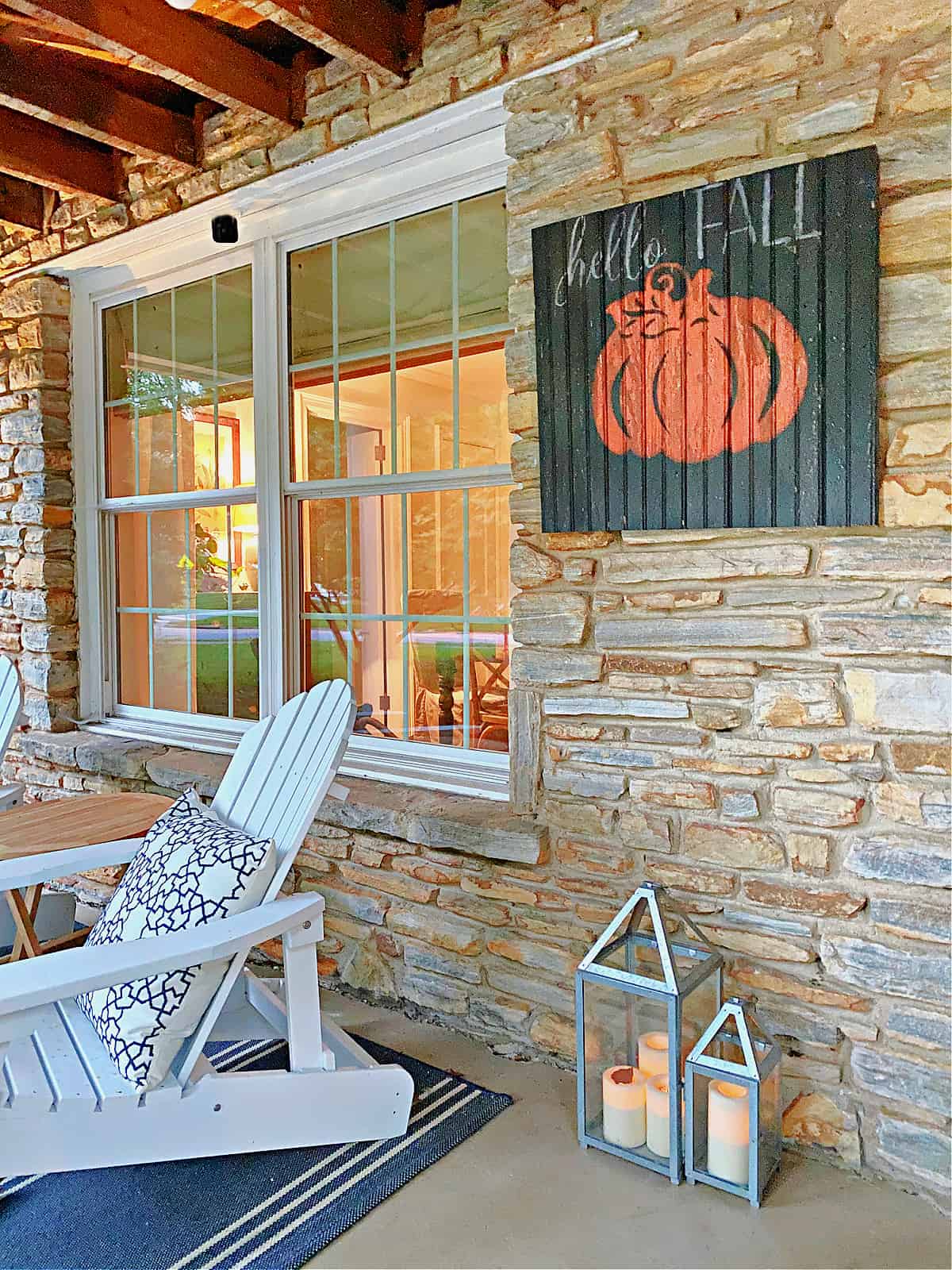 wood pumpkin sign hanging on wall