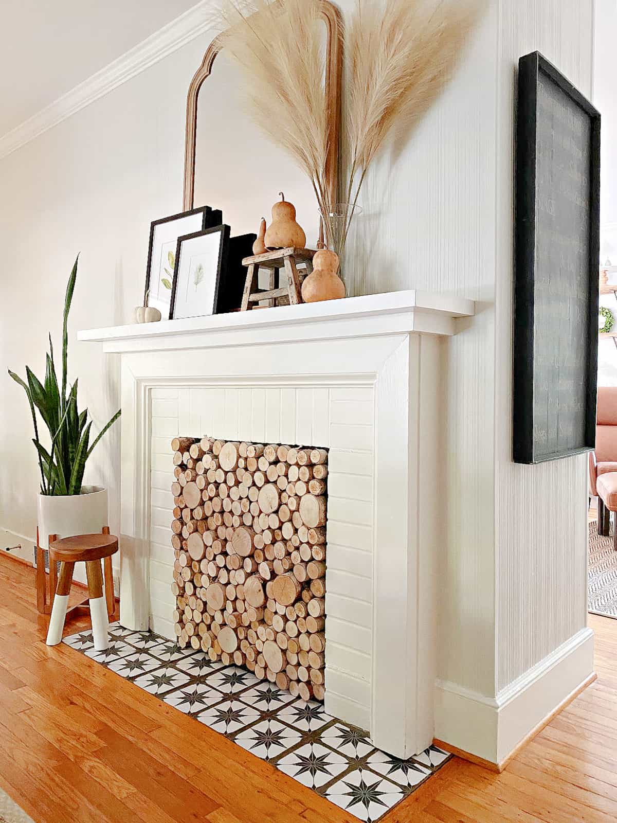 fireplace with tile stickers on hearth