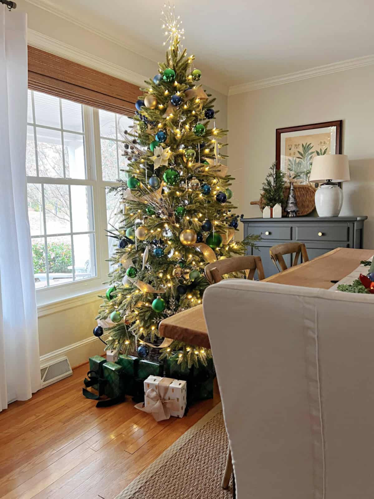 Christmas tree in front dining room window