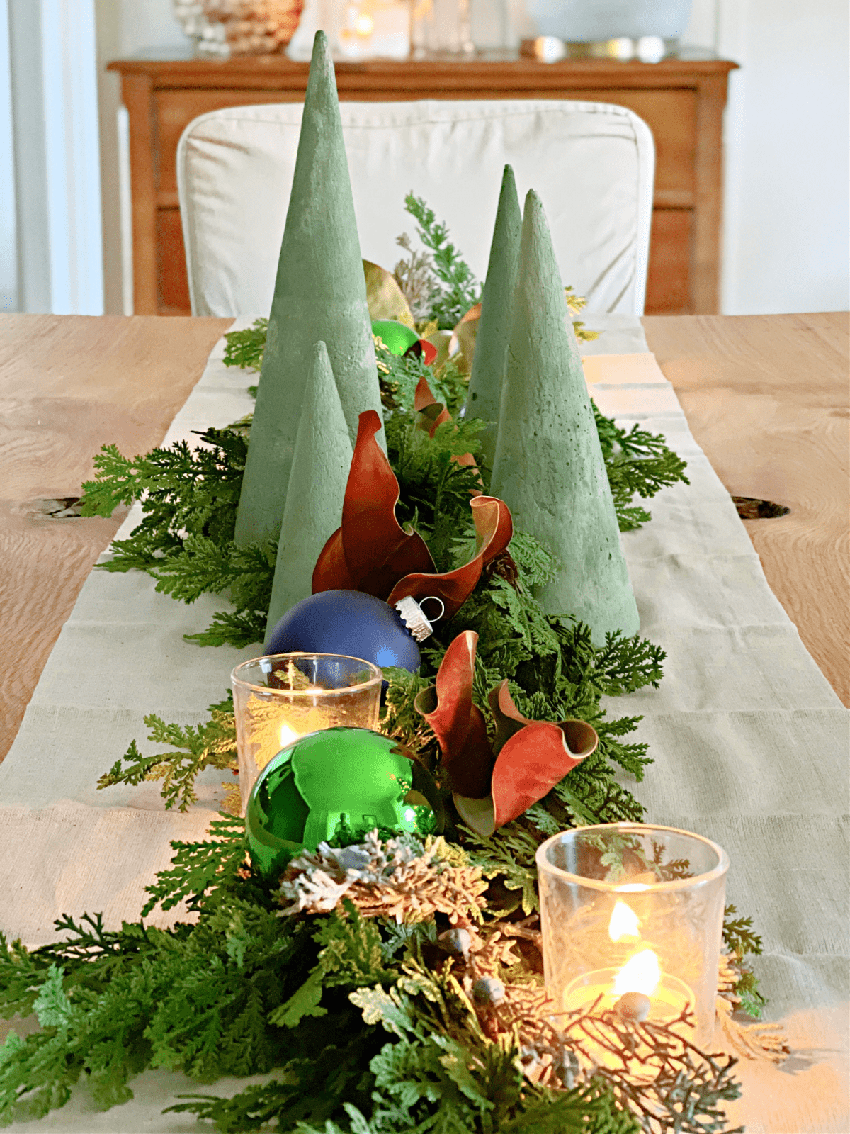 How to Make a Concrete Christmas Tree display photo green dyed concrete Christmas trees as centerpiece on dining table