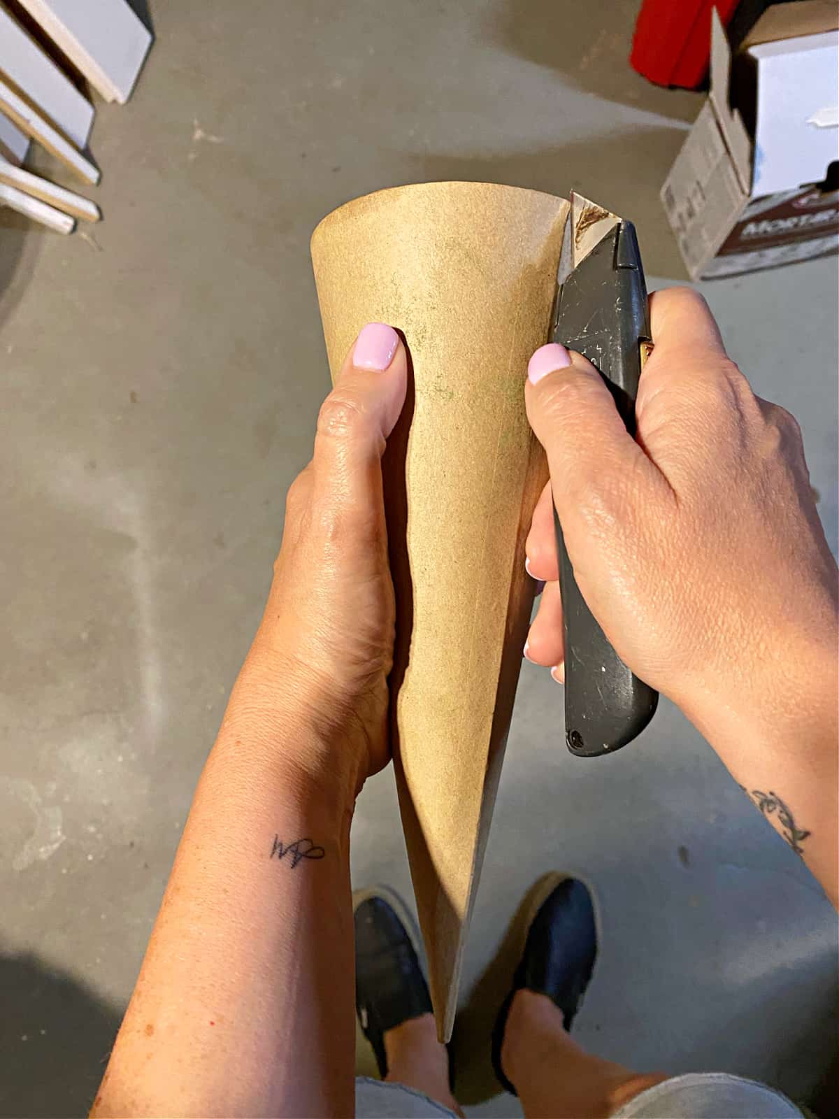 How to Make a Concrete Christmas Tree cutting pic using razor knife to score cardboard cone