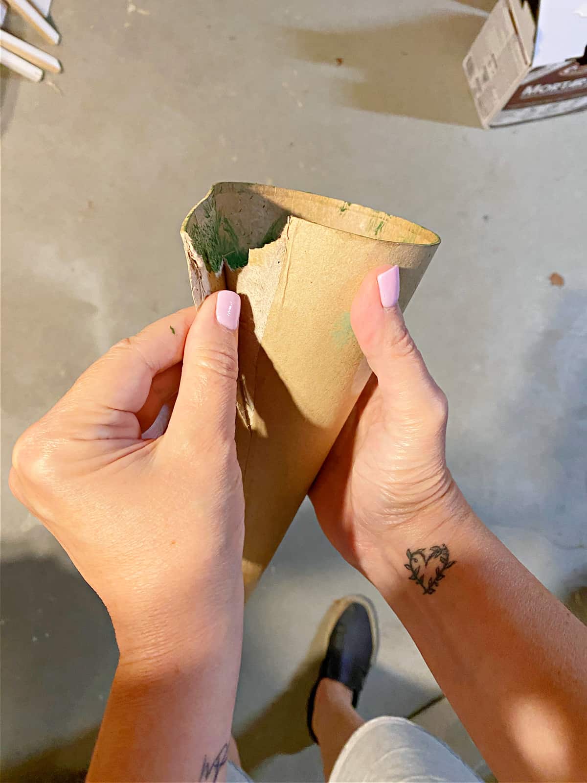 How to Make a Concrete Christmas Tree peeling pix peeling off cardboard cone from concrete