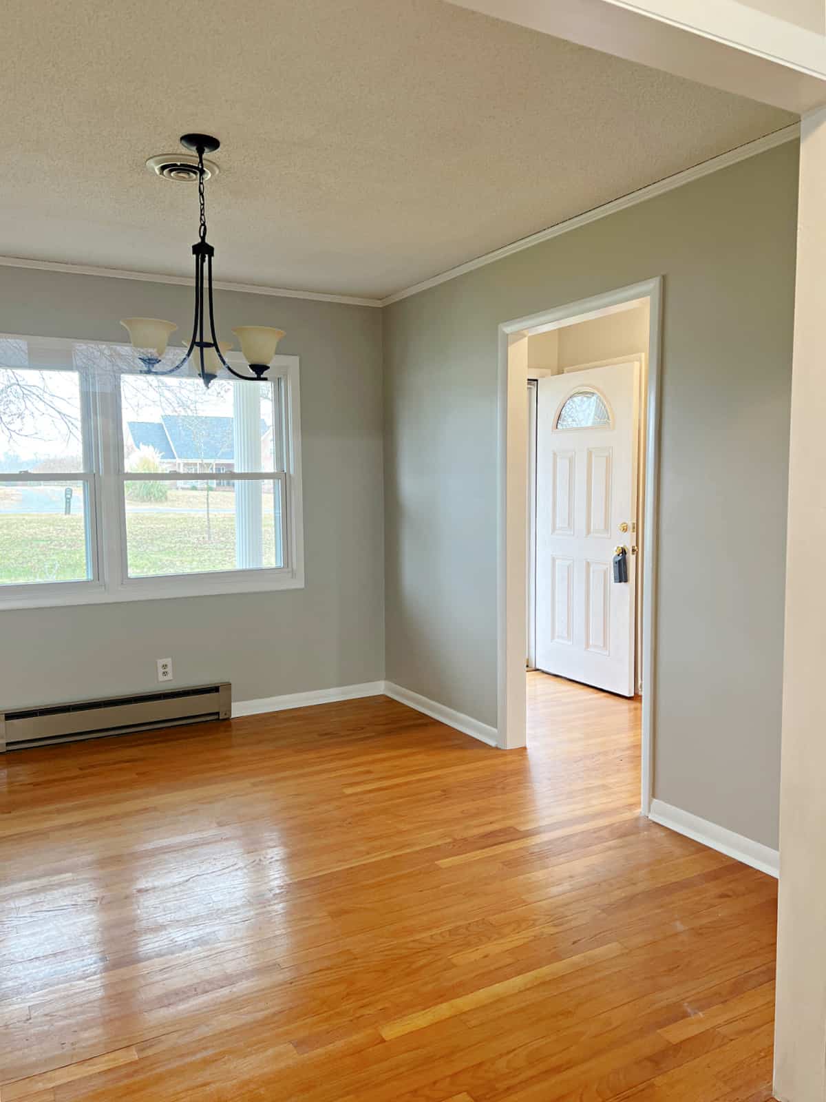 empty living room space with gray walls