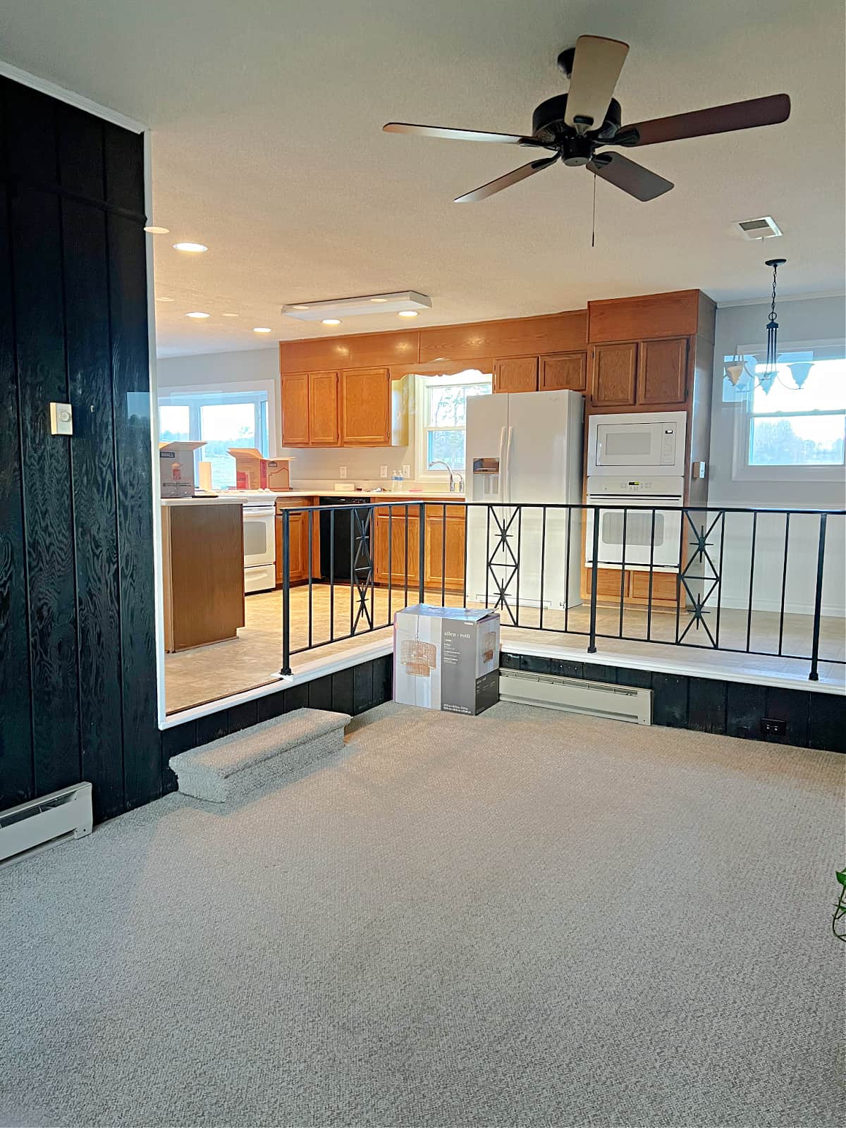 view of oak cabinets in kitchen from family room