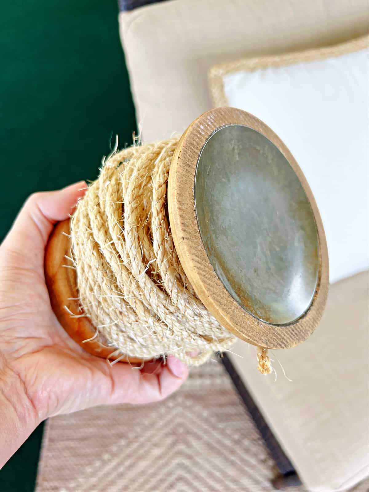 twine wrapped around a wooden candle holder