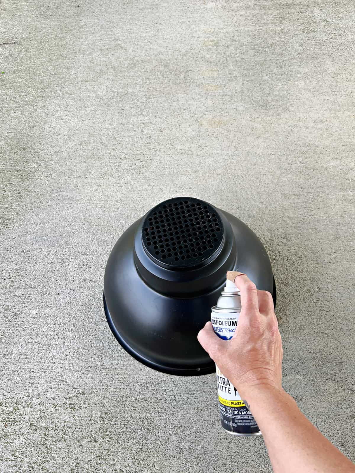 Easy DIY Plant Stand snapshot painting a planter pot black