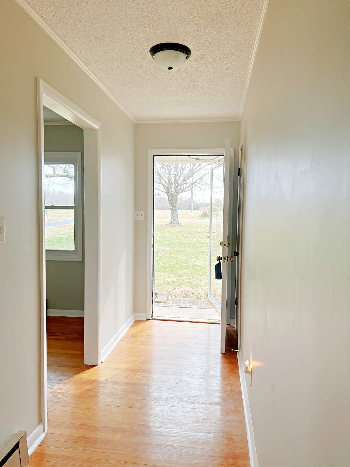 entryway with front door open to outside