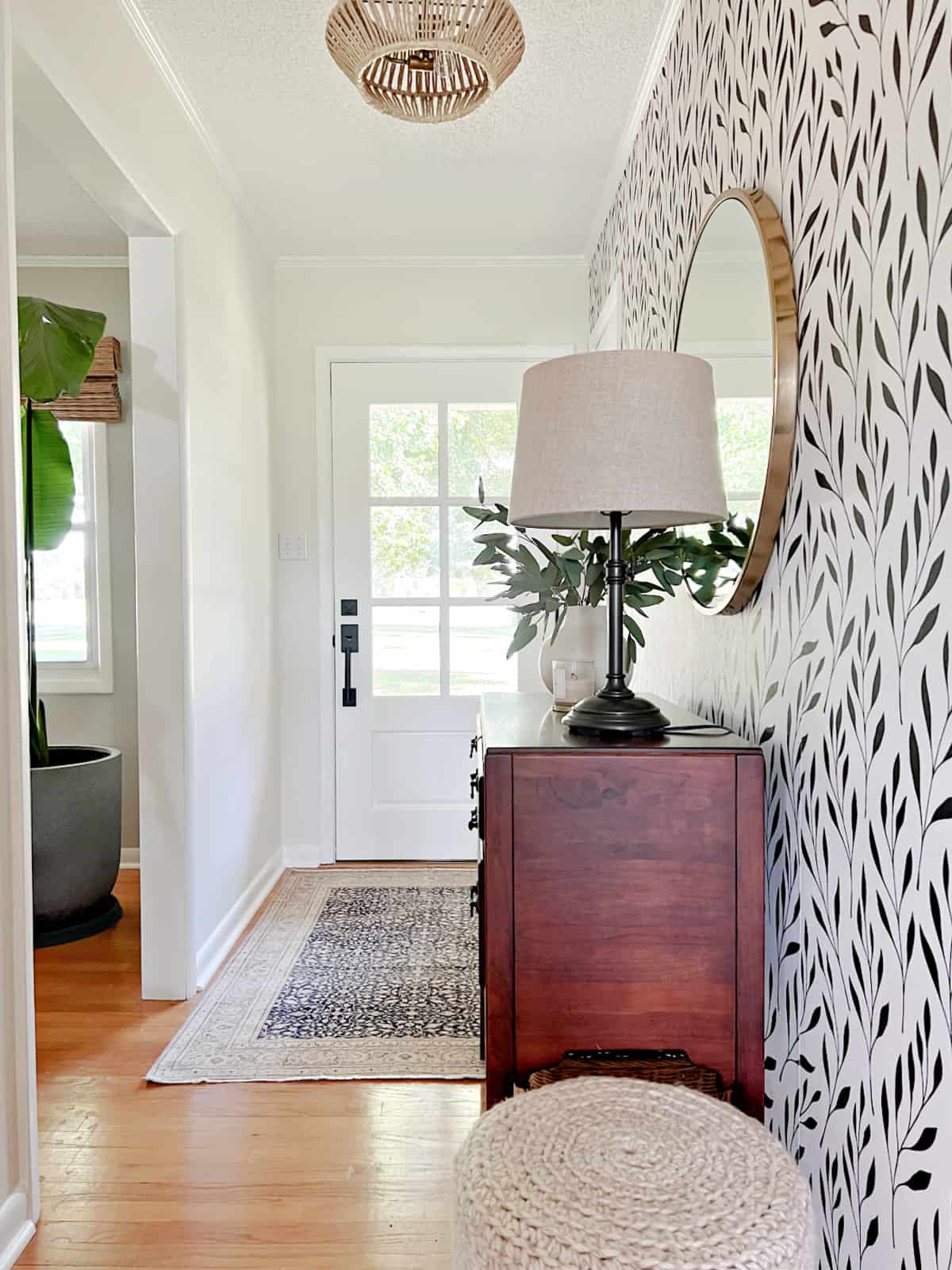 entryway after makeover with new wood front door