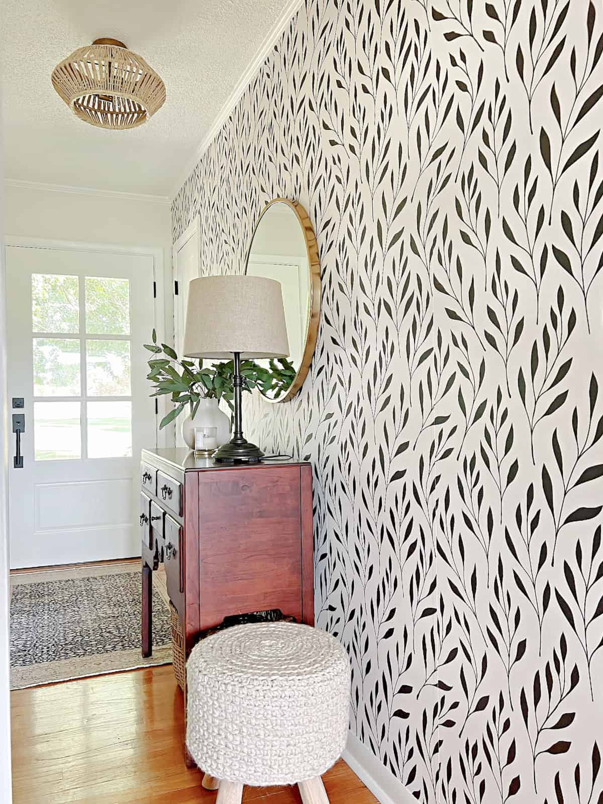 small entryway makeover with wallpaper and console