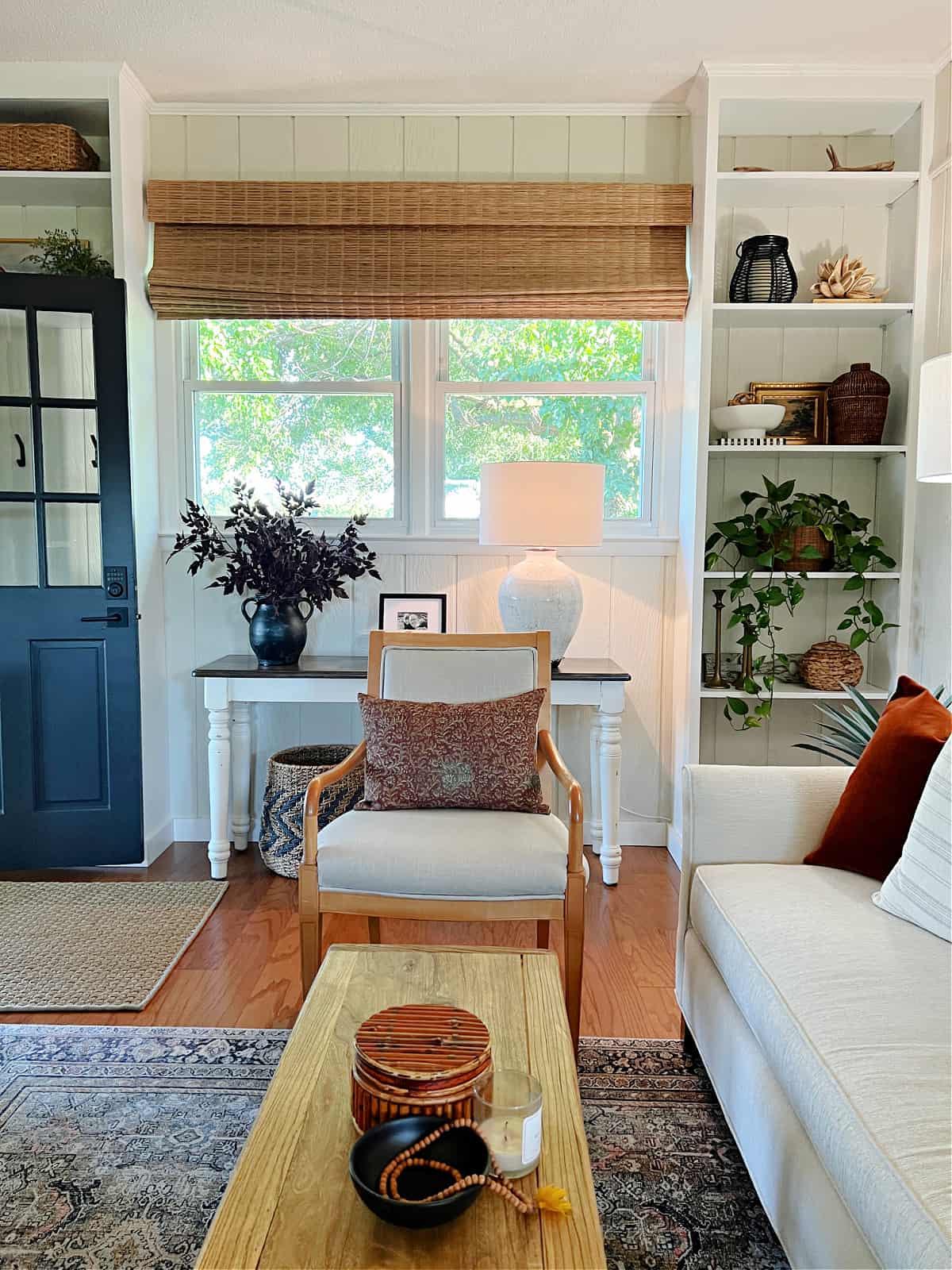 view of decor on living room coffee table and console table