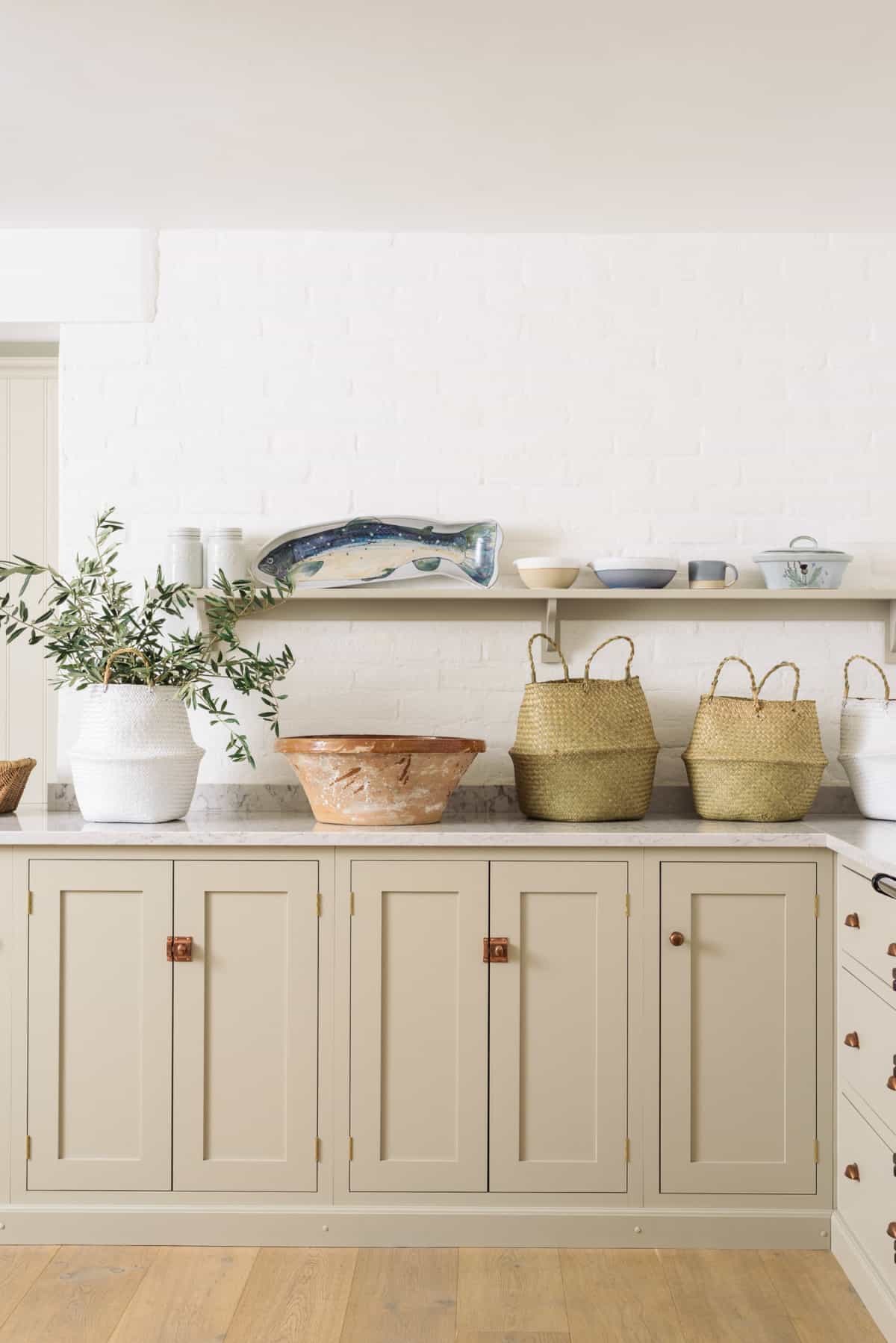 lower kitchen cabinets painted in greige color