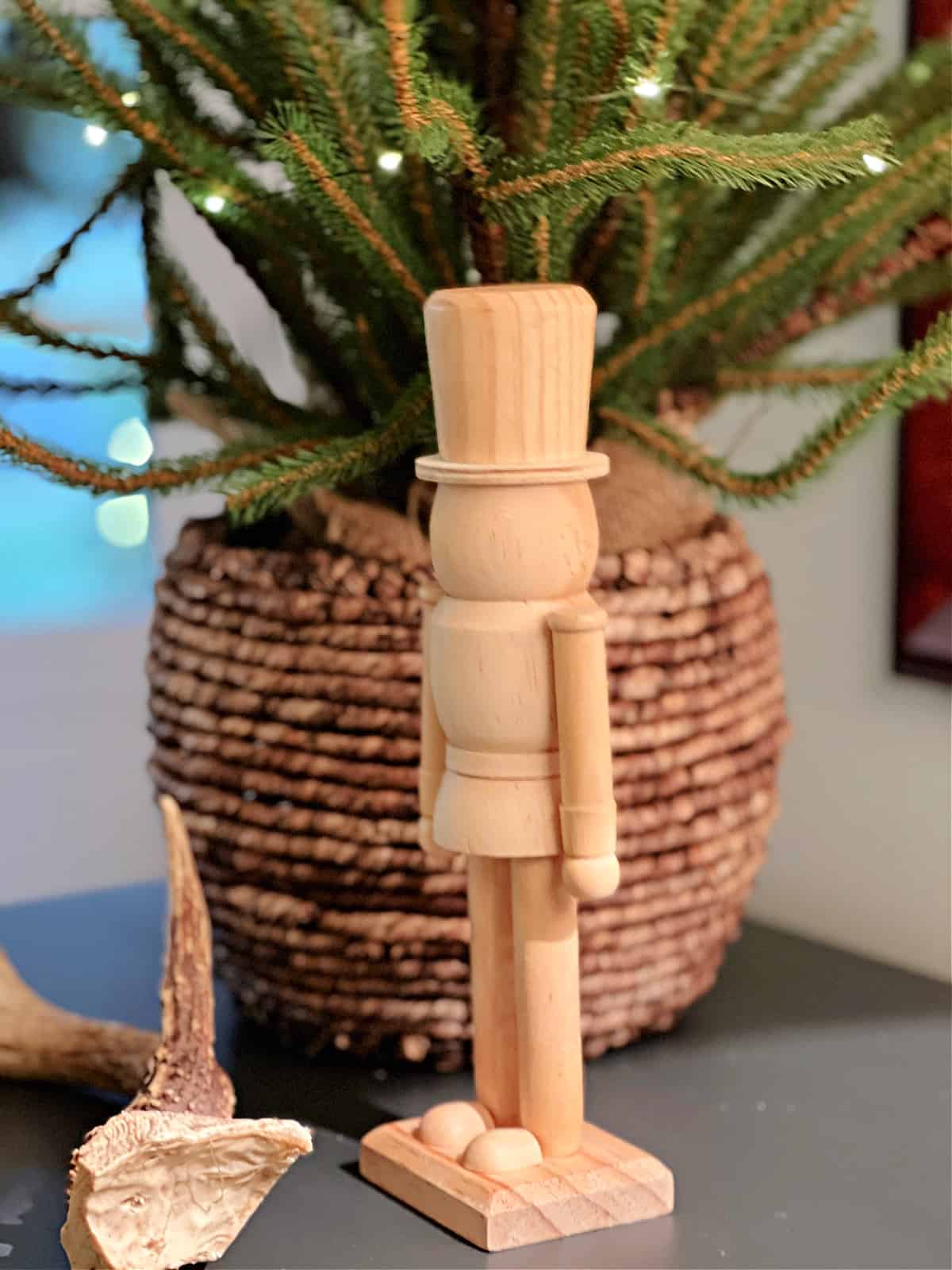 wooden soldier and tree on cabinet