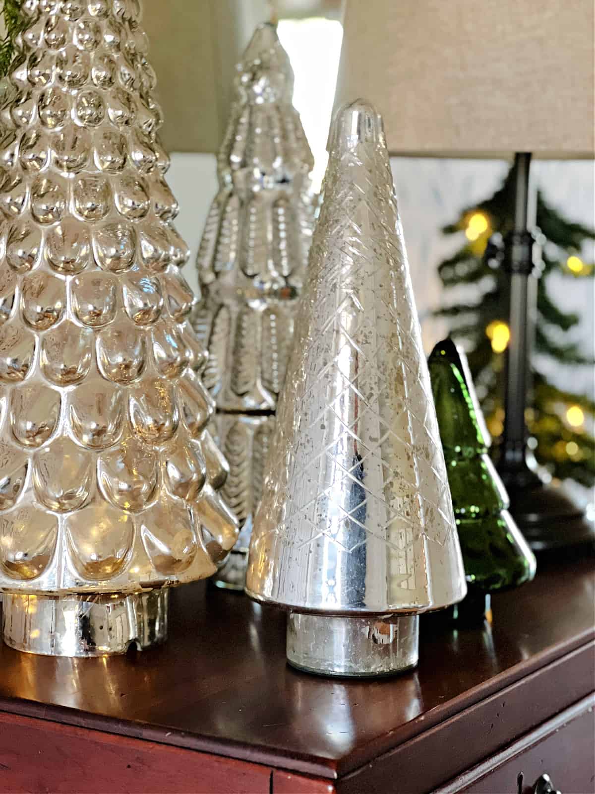 mercury trees on entryway cabinet