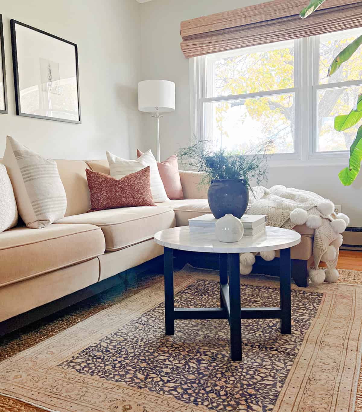 DIY round coffee table in living room with decor