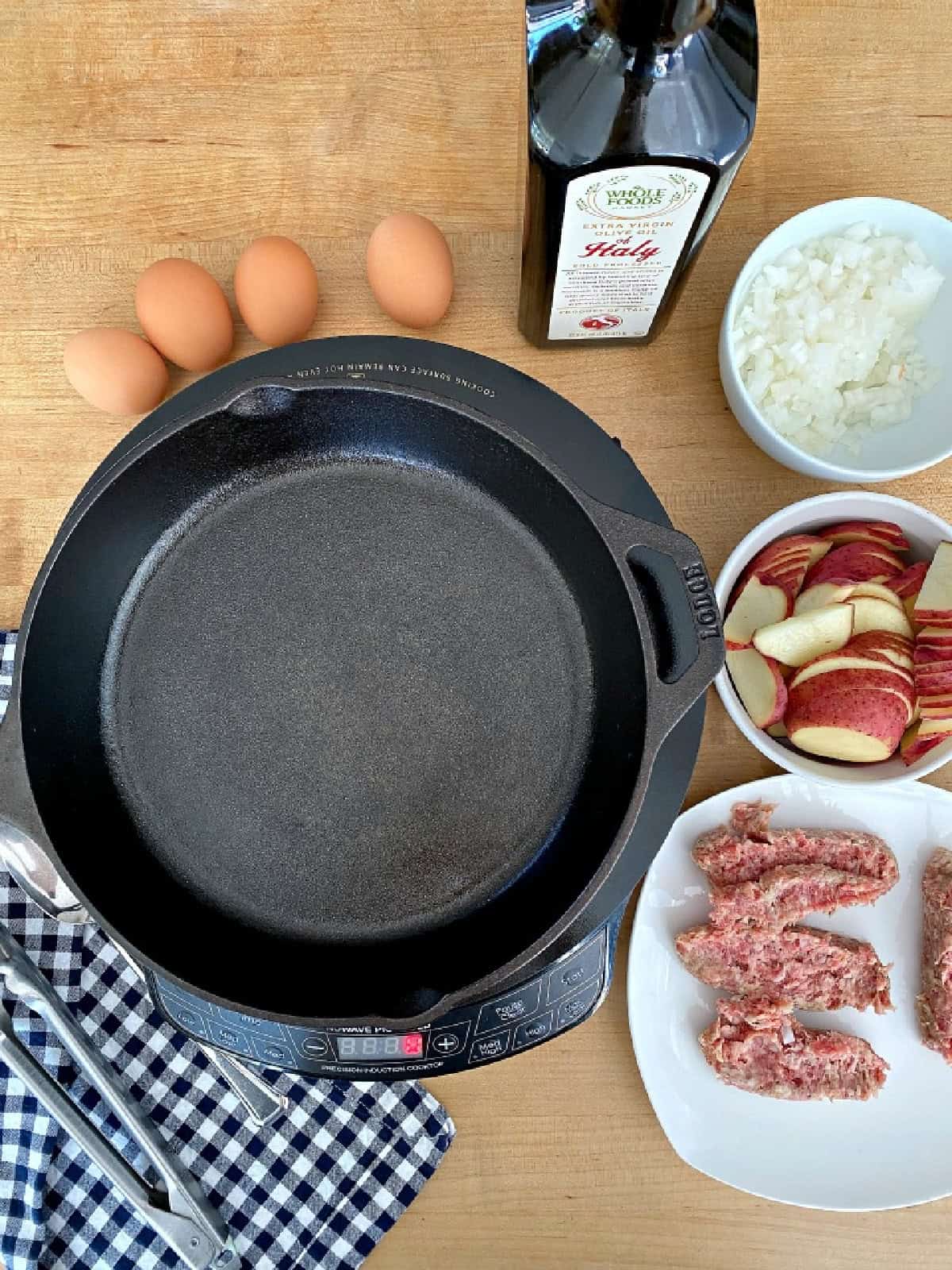 ingredients to make camping breakfast skillet, eggs, potatoes and sausage