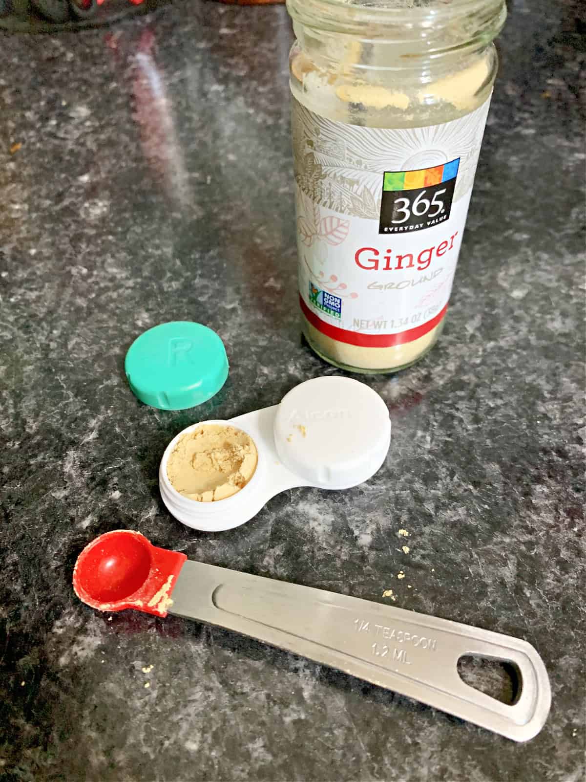 Camp Kitchen Gear & Packing List pix contact case with ginger and measuring spoon