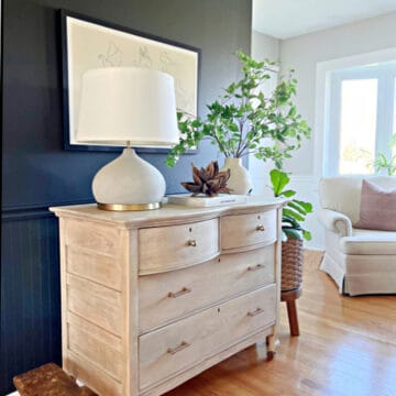 black matte paint on wall with decorated chest