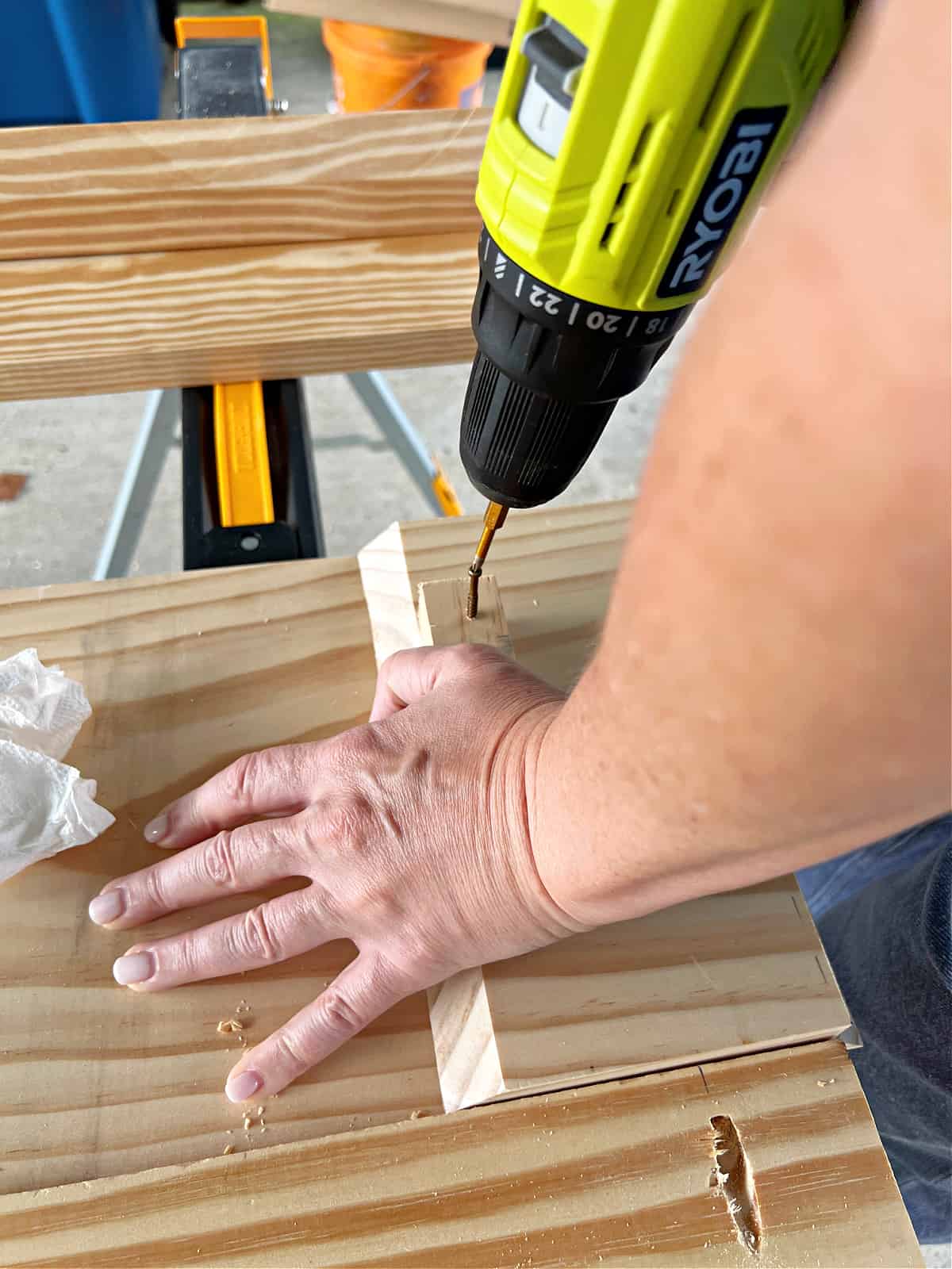 drilling a hole in small piece of pine wood