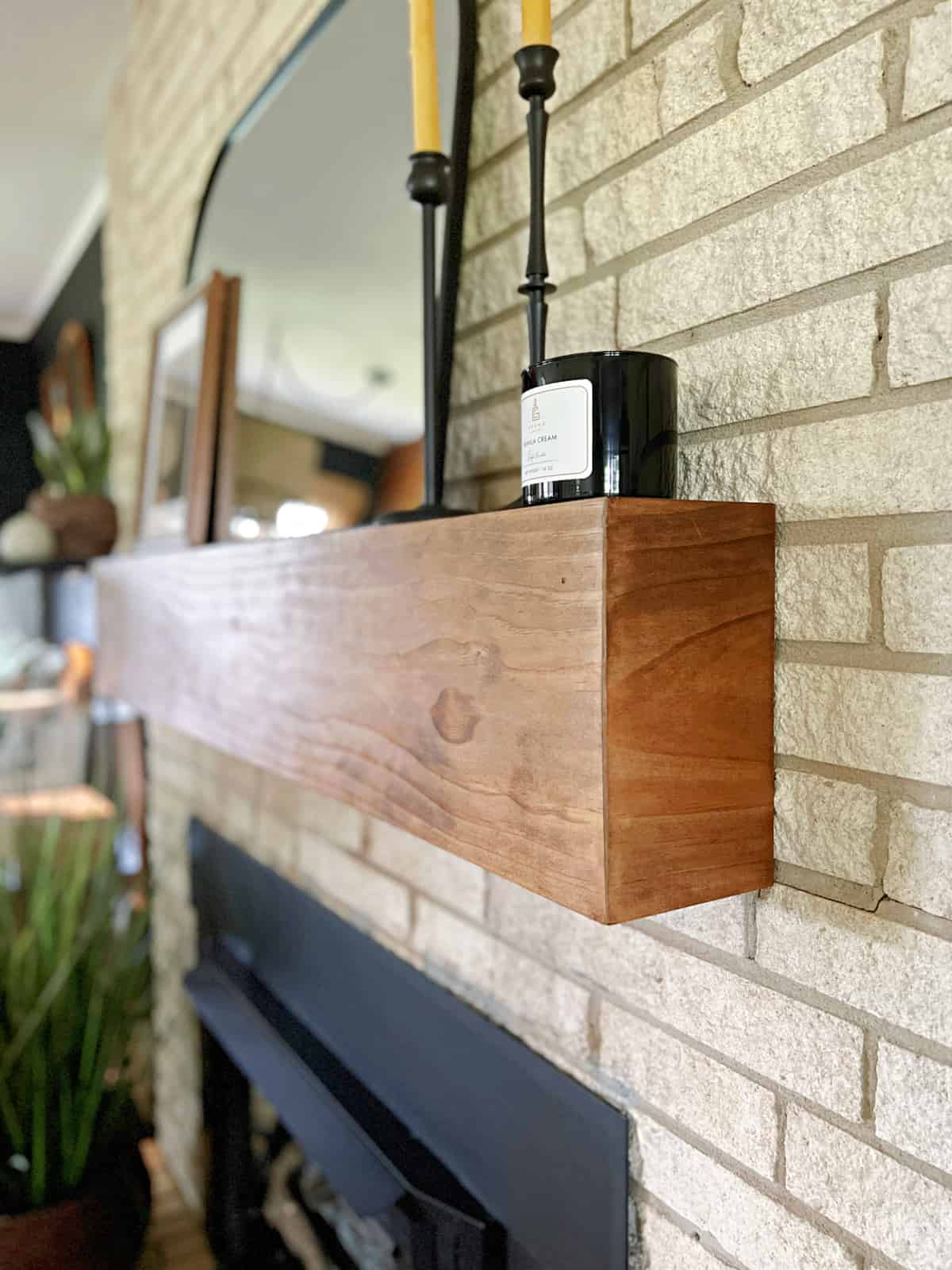 side view of DIY wood floating mantel shelf