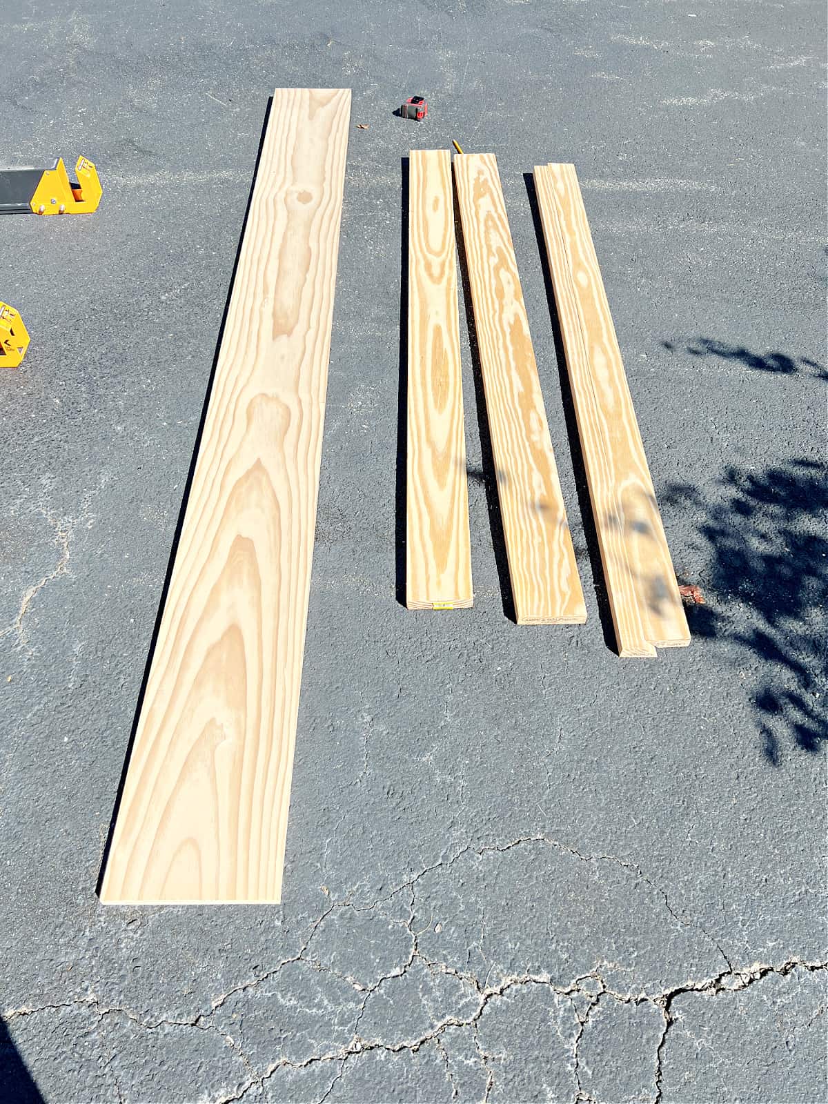 pine boards used to make a fireplace mantel shelf