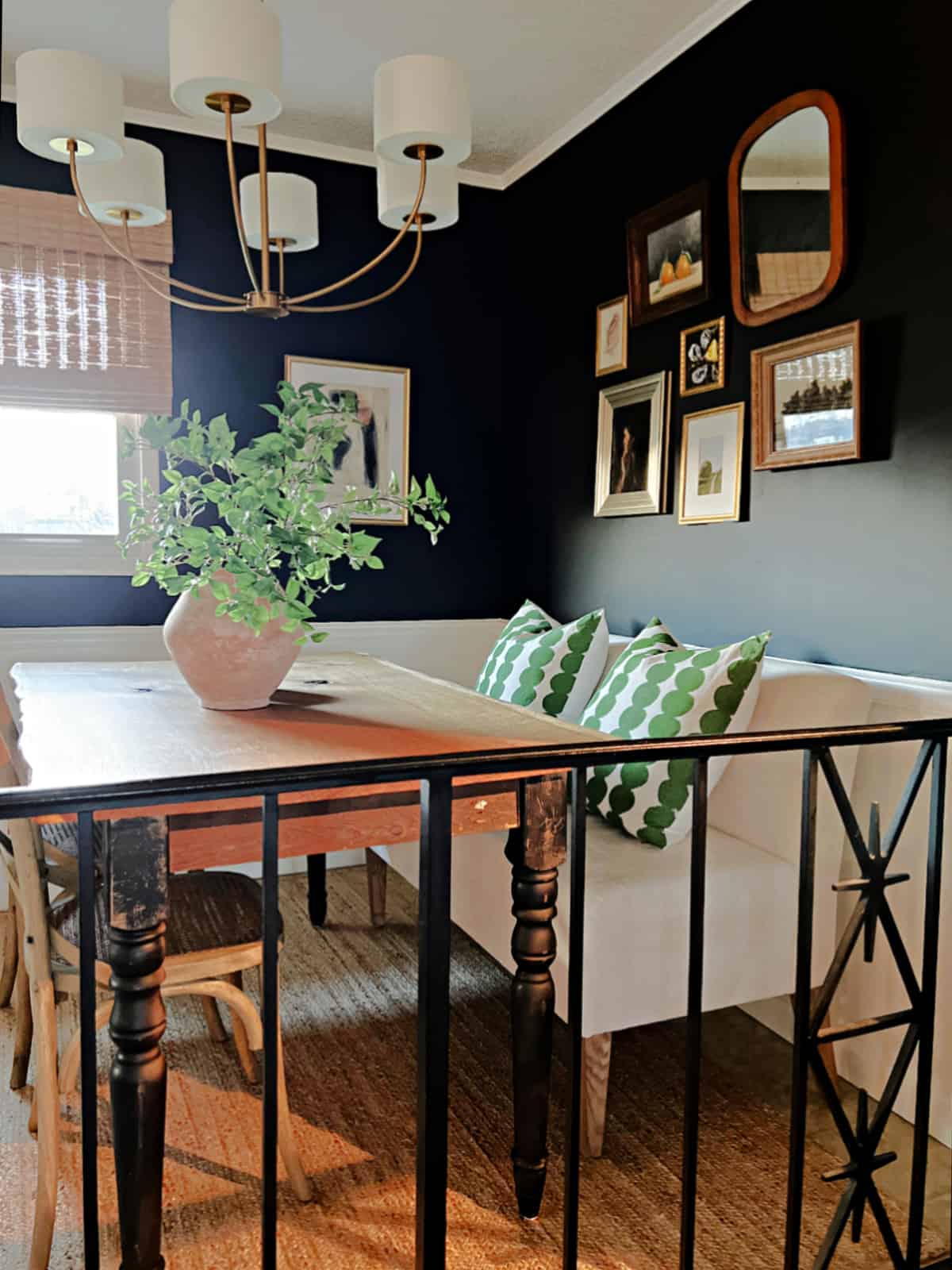 small breakfast nook wth black painted walls