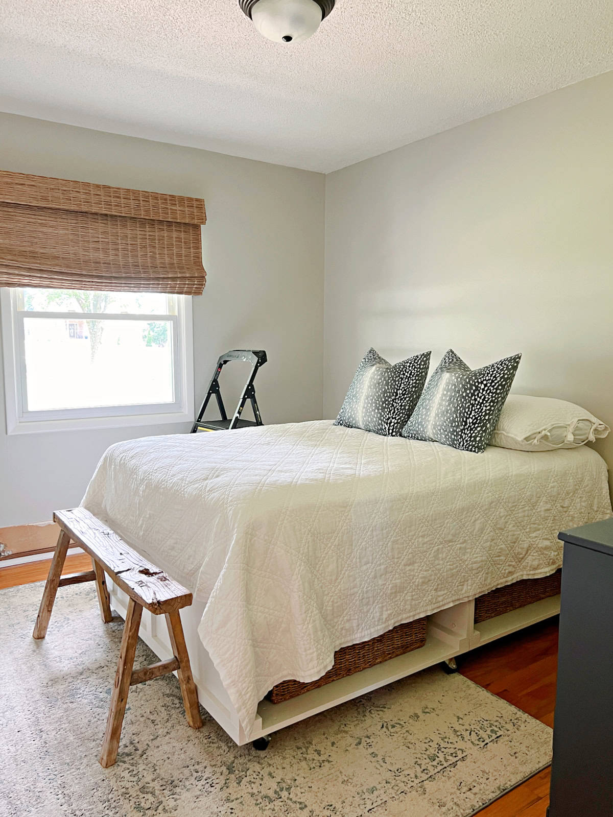 small guest bedroom with gray walls