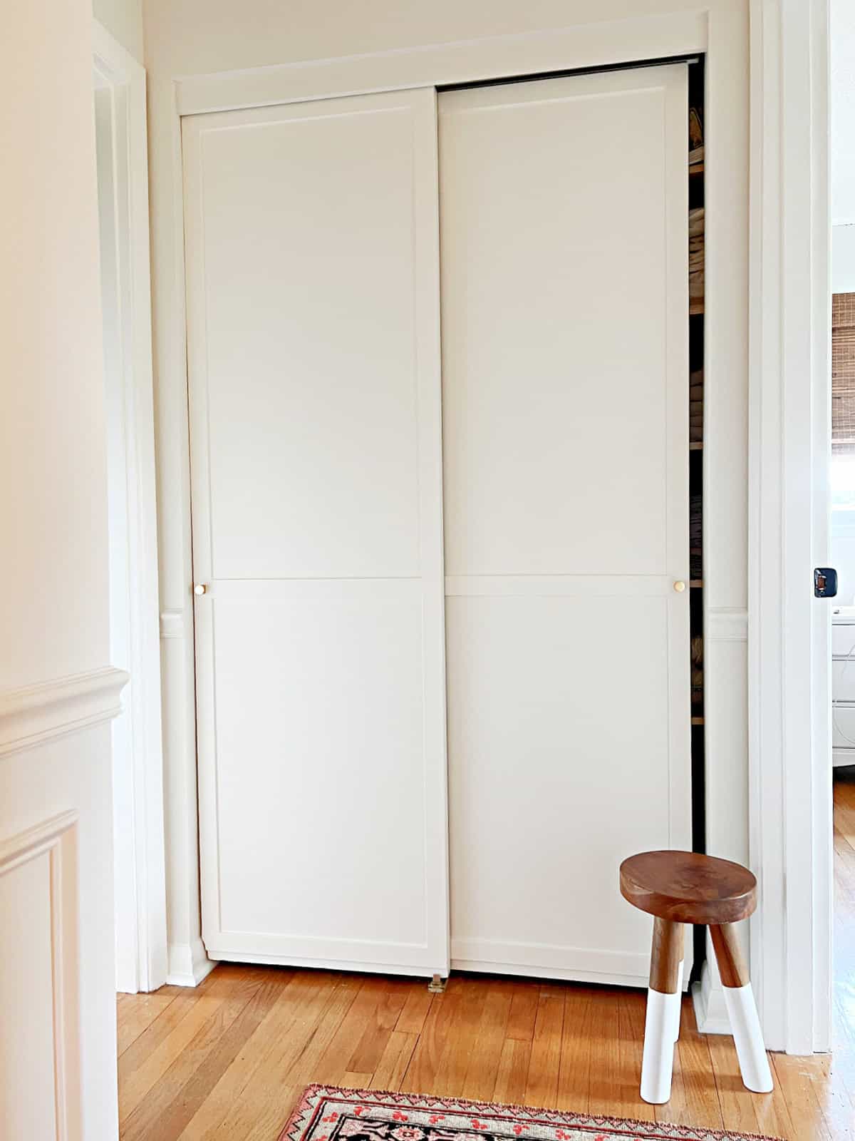 white painted sliding closet doors