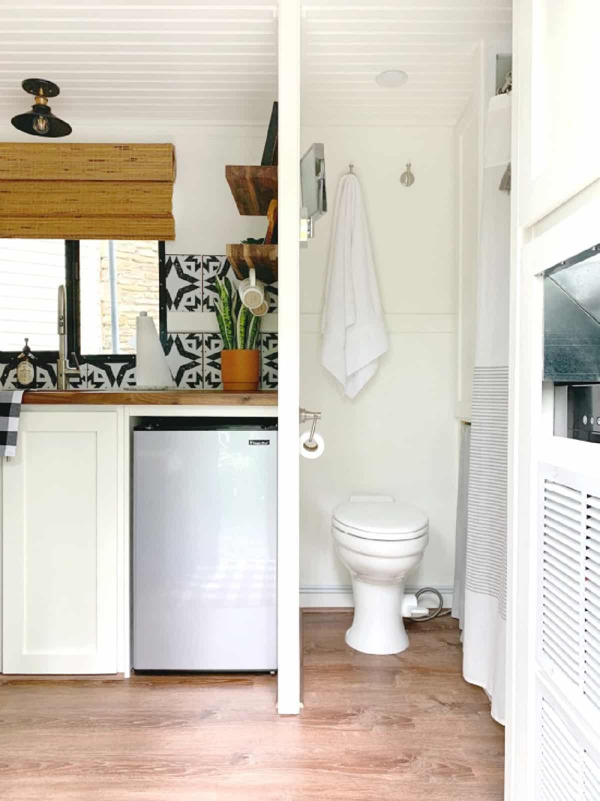 DIY RV Privacy Curtain pic looking at toilet and kitchen from doorway in small RV