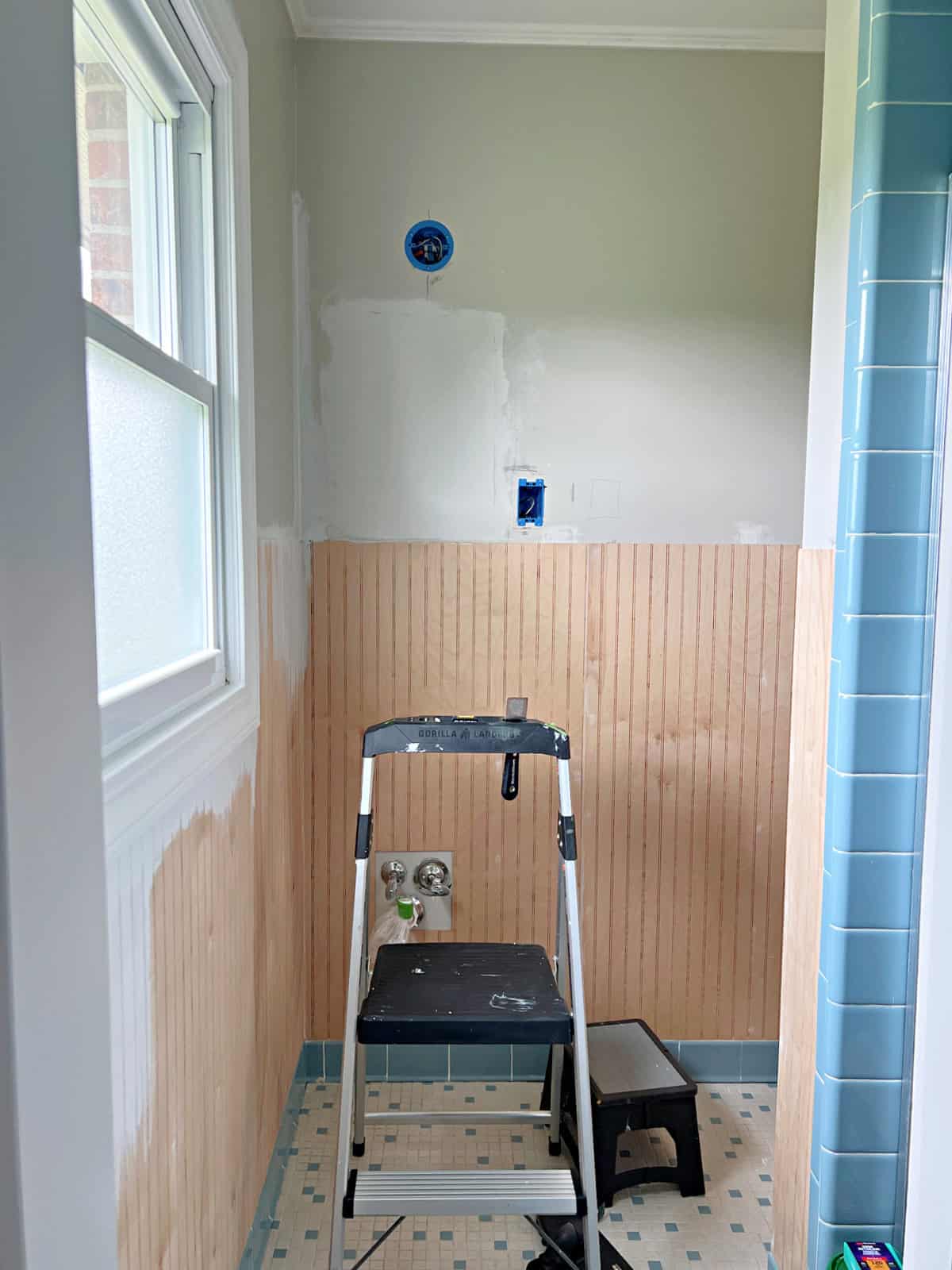 bead board installed in small bathroom